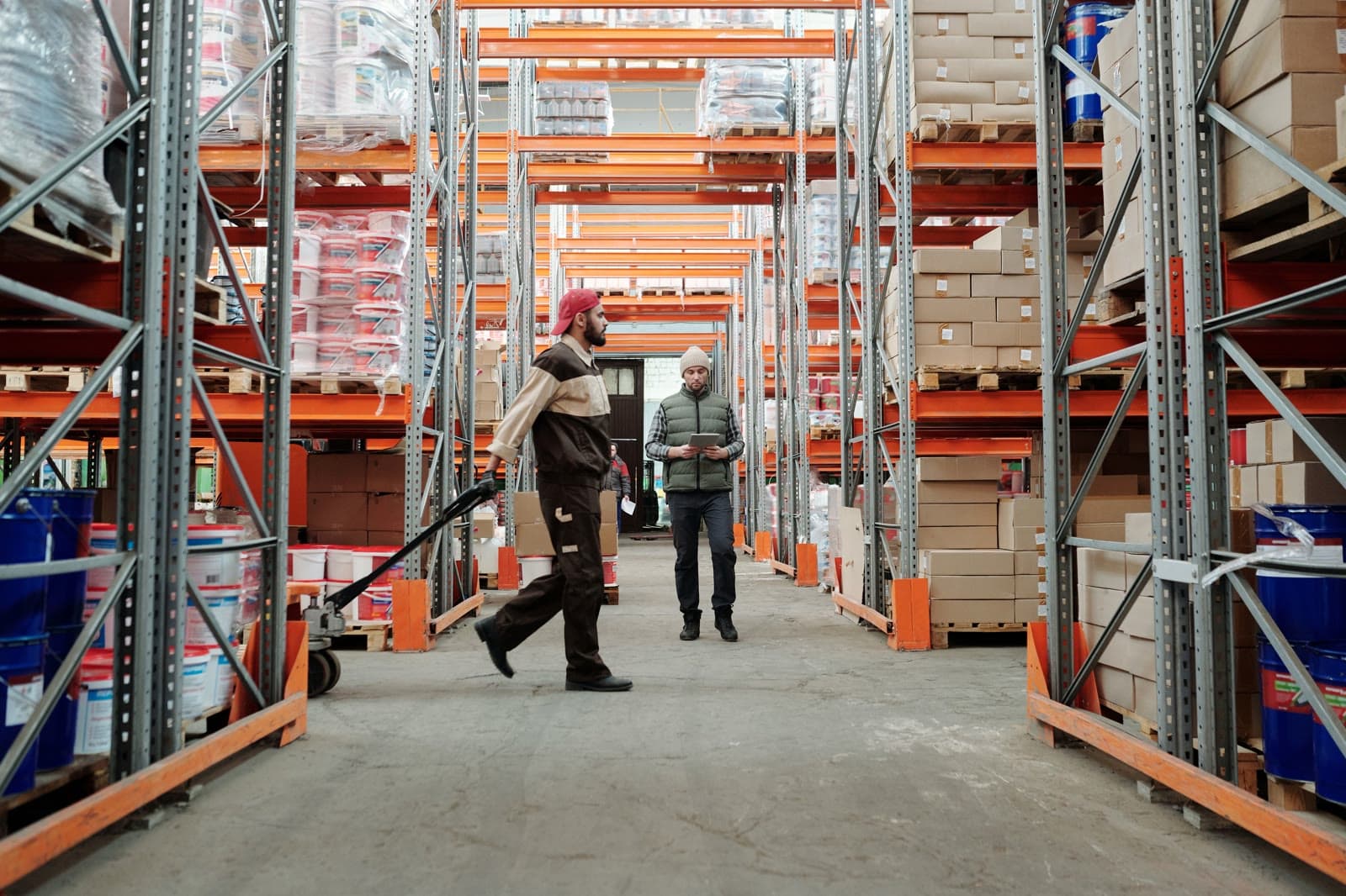 Warehouse team coordinating goods re-export and logistics handling